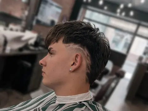 Mullet z teksturą i fade — Gentlemen Barber Shop Sanok